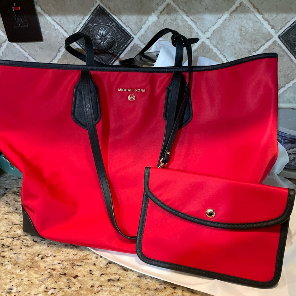 Michael Kors Red and Black Tote with Pouch. NWT kept in original dust bag